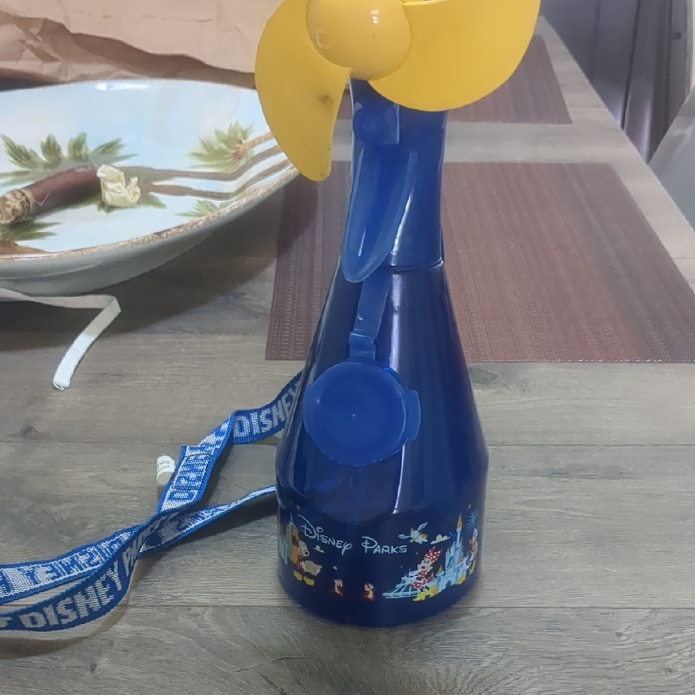 Disney Parks Blue and Yellow Handheld Fan